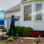 Image of Perfect Power Wash power washing a white sided house