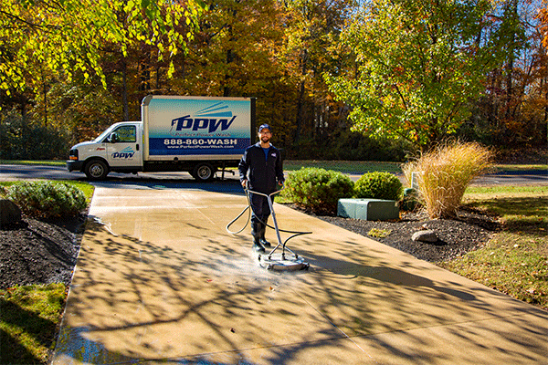 Perfect Power Wash technician surface cleaning concrete